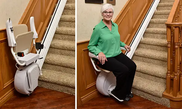 Smiling woman using the Savaria K2 straight stair lift
