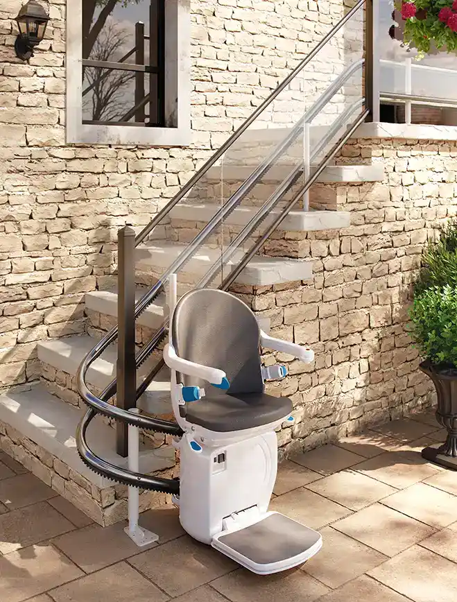Handicare 4000 outdoor stair lift with slate seat on brick steps