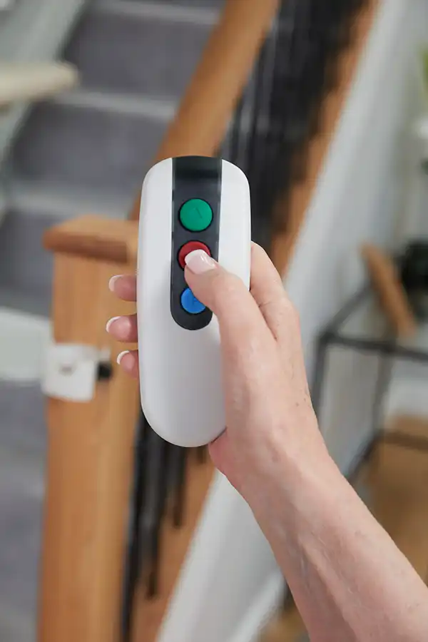 Remote control calling a Handicare stair lift to another landing