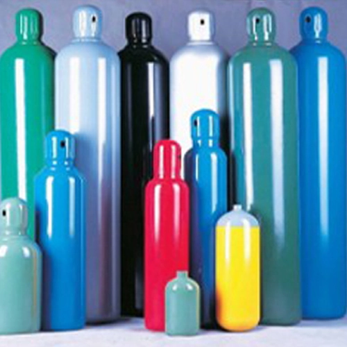 Colorful cannisters containing hazardous materials, specifically designed for secure transport using material lifts.