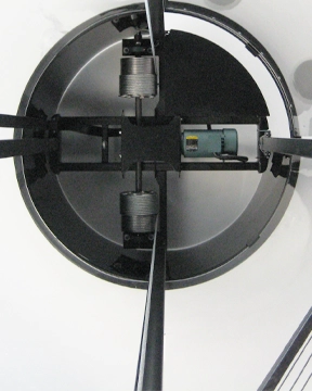 Overhead view of a winding drum elevator system with dual cable drums, motor housing, and structural frame.